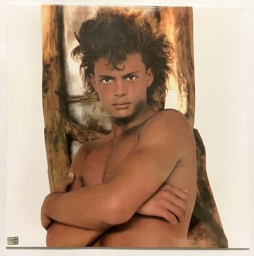 Luis Miguel - BUSCA UNA MUJER